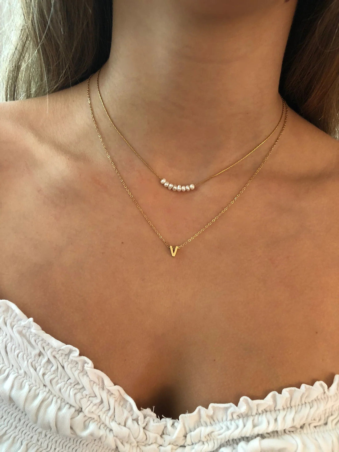 A stainless steel baby pearl necklace available at bubs & sass.