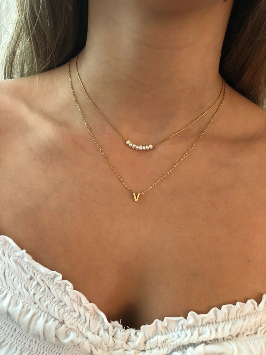 A stainless steel baby pearl necklace available at bubs & sass.