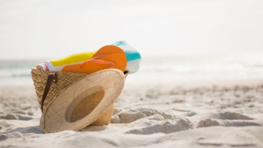 An image showing beach essentials for a summer day.