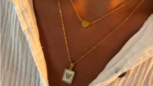 A tiny heart necklace available at bubs & sass