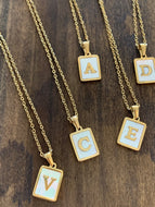 initial shell pendant