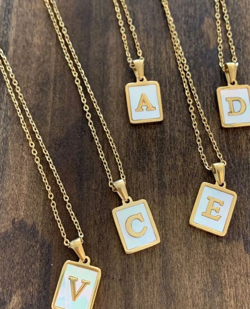 initial shell pendant
